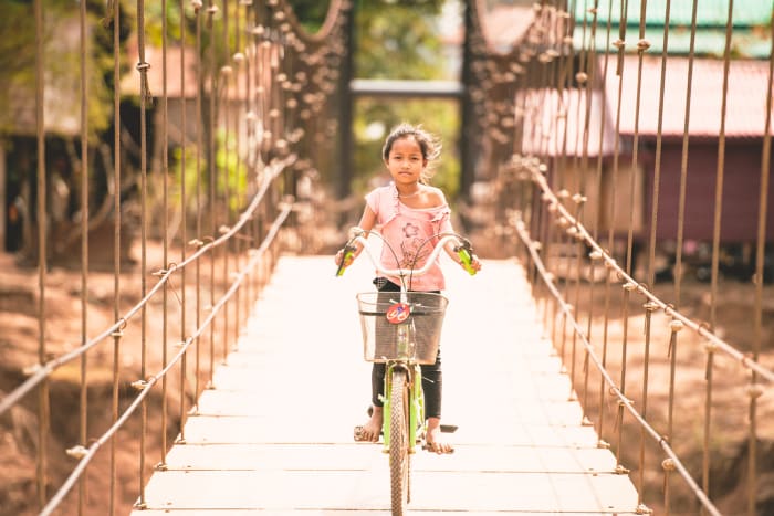Laos_girl_bridge_RedBullMediaHouse.jpg
